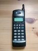 Mitsubishi-MT-1097F0R6A-vintage-mobile-phone-and-battery-charger.jpg